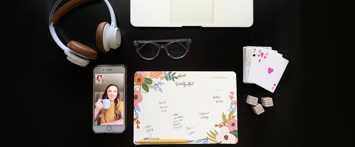 View of desk with planner, games and FaceTime.