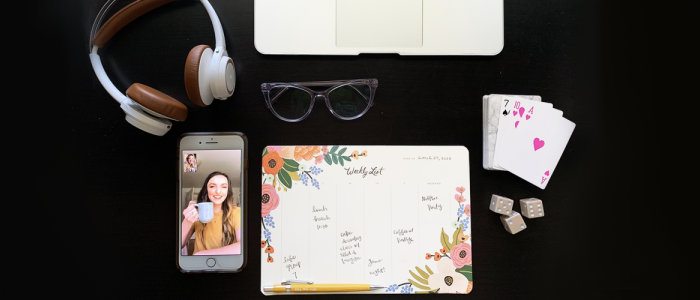 View of desk with planner, games and FaceTime.